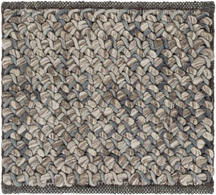 Close-up of the hand woven Hansell Area Rug. Features charcoal, ice blue, and ivory wool in a braided texture. Swatch