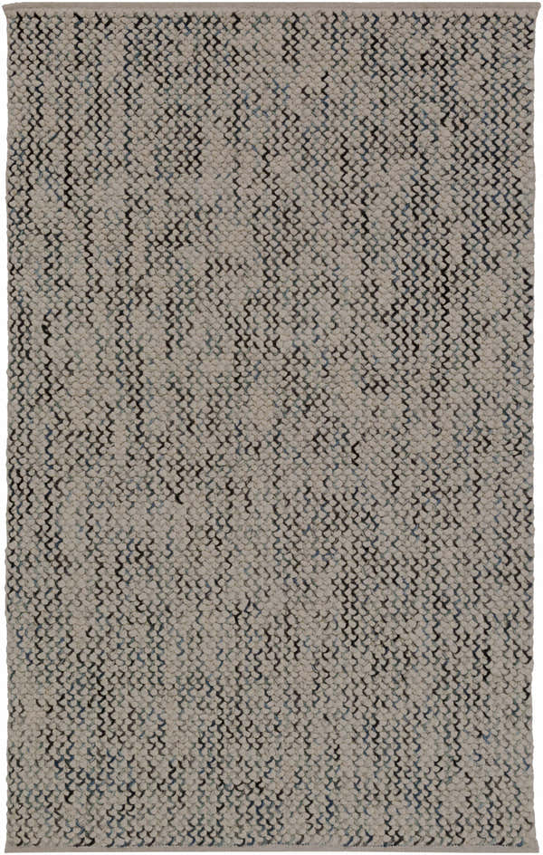 Close-up of the hand woven Hansell Area Rug. Features a charcoal, ice blue, and ivory geometric pattern. Design-Rectangle-576