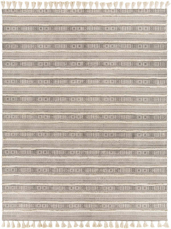 Close-up of the Hanslope Area Rug. Hand-loomed cotton rug with charcoal, cream, and beige stripes and tassel fringe. Design-Rectangle-810