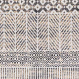 Close-up of Hassocks Area Rug featuring a geometric pattern in charcoal, cream, light gray, and tan. Swatch