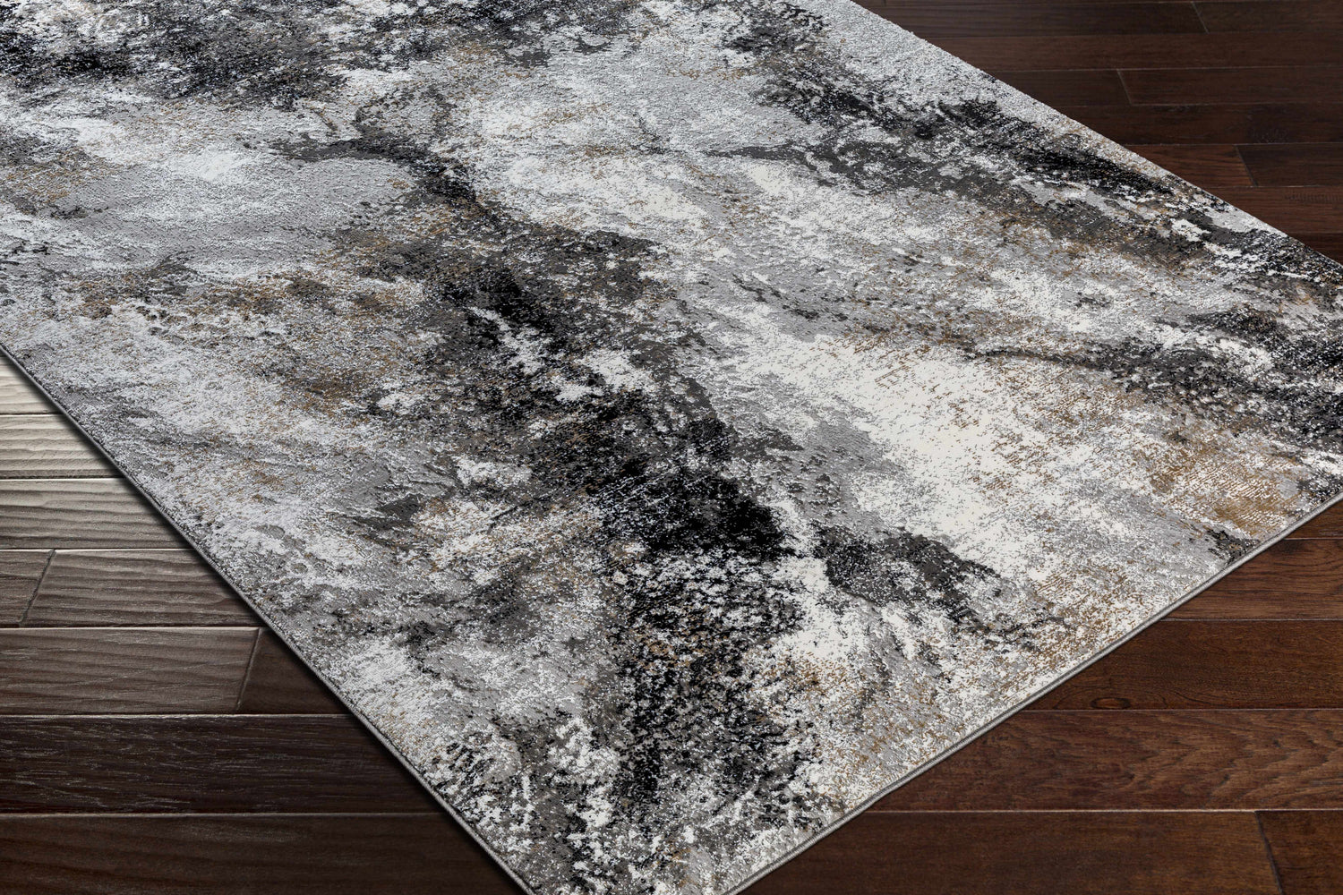 Close-up of the Contemporary Marble Area Rug, featuring a black, gray, and ivory marble-like pattern. Corner
