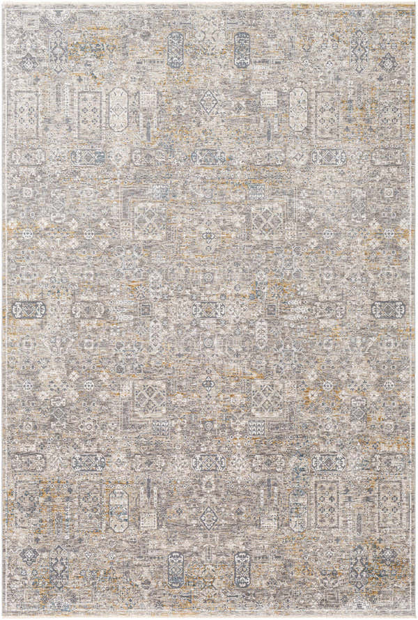 Close-up of the Heacham Luxe Fringe Rug in blue, camel, and gray. Contemporary distressed pattern and fringe detail. Design-Rectangle-6796