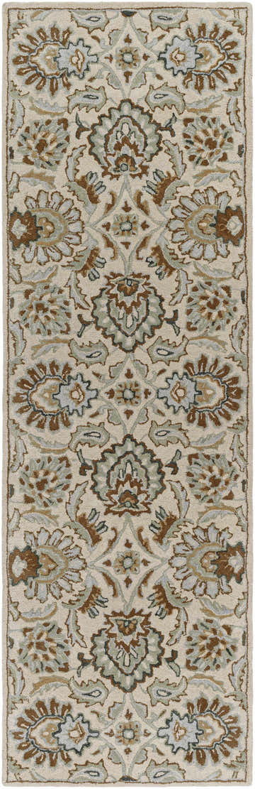 Close-up of the Helia Area Rug. Beige wool rug with a traditional floral pattern in brown, gray, and camel tones. Hand-tufted texture. Design-Runner-268