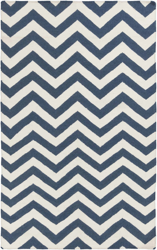Close-up of Hermleigh Area Rug. Cream and dark blue, hand-woven wool rug with a bold chevron pattern. Design-Rectangle-58