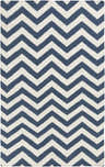 Close-up of Hermleigh Area Rug. Cream and dark blue, hand-woven wool rug with a bold chevron pattern. Design-Rectangle-58