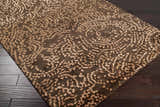 Close-up of the Pensacola 5x8 Brown Premium Wool&Viscose Rug, featuring a beige abstract pattern on a dark brown background. Corner
