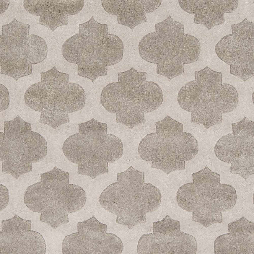 Close-up of the Highspire Area Rug, showcasing a light gray quatrefoil pattern on a taupe background. Hand-tufted texture. Swatch