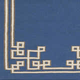 Close-up of the blue Hinckley Area Rug with a light beige geometric border pattern. Swatch