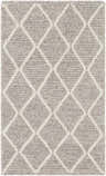 Close-up of the hand woven Hindley Area Rug. Cream diamond pattern on a gray wool and viscose rug. Design-Rectangle-23