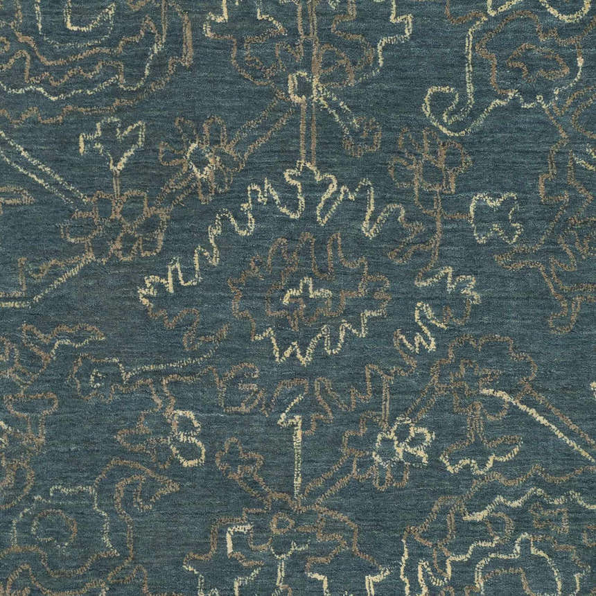 Close-up of the Hinkle Teal Premium Wool Carpet, featuring a traditional oatmeal and light brown pattern on a dark blue background. Swatch