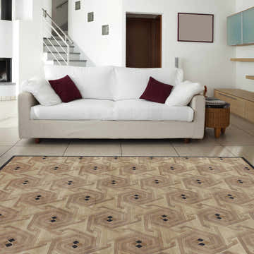 Living room scene with a beige sofa and the geometric patterned Hisle Area Rug. Roomscene-Rectangle