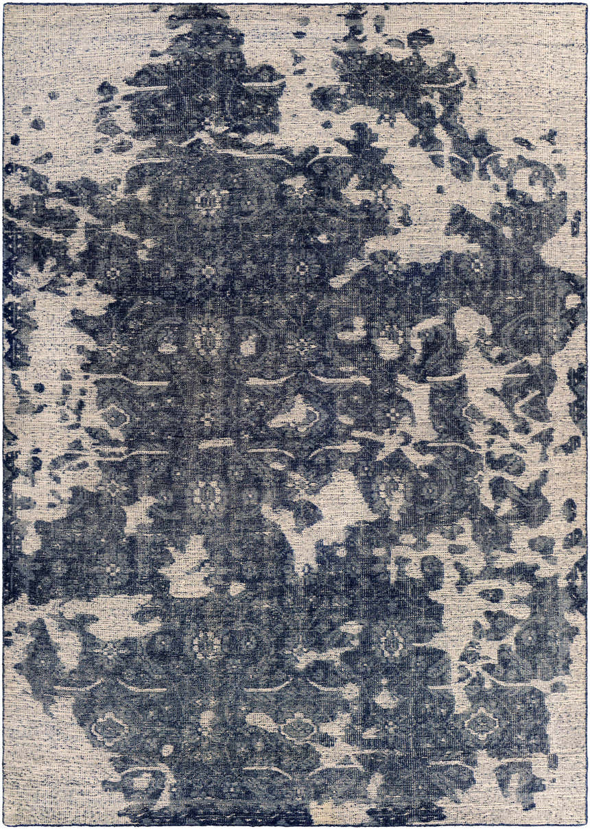 Close-up of the Holmes Carpet - Clearance. Hand-knotted wool rug in ivory and navy with a distressed vintage pattern. Design-Rectangle-811