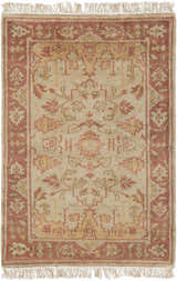 Detailed view of the hand-knotted Hobart Area Rug in brown, burgundy, and mustard tones with a traditional floral pattern. Design-Rectangle-23