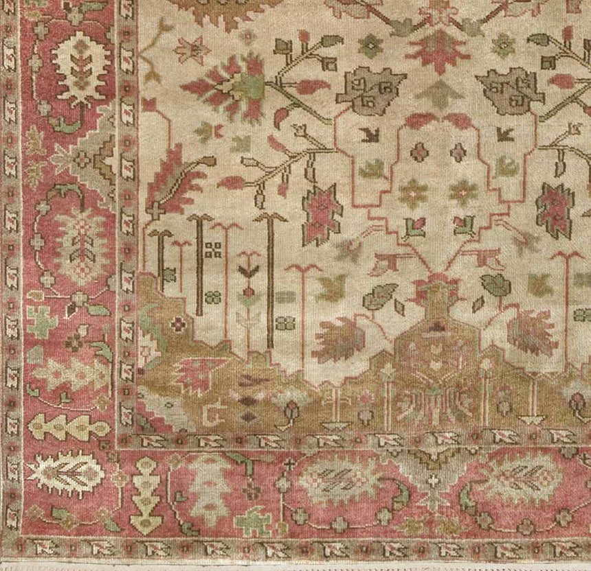 Close-up of the hand-knotted Hobart Area Rug, showcasing its traditional floral pattern and brown, burgundy, and olive tones. Swatch