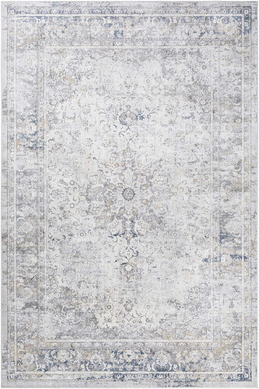Close-up of the Holcombe Area Rug; a traditional, machine-woven rug in charcoal, cream, gray, and tan. Design-Rectangle-6796