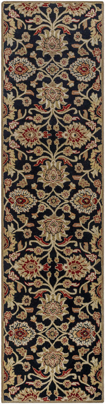 Close-up of the Conesus 1053 rug. Hand-tufted black wool rug with traditional floral pattern in brown, red, mustard, and oatmeal. Design-Runner-312