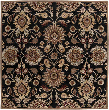Close-up of the Conesus 1053 hand-tufted black wool rug. Features a traditional floral pattern in brown, burnt orange, and oatmeal tones. Design-Square-8