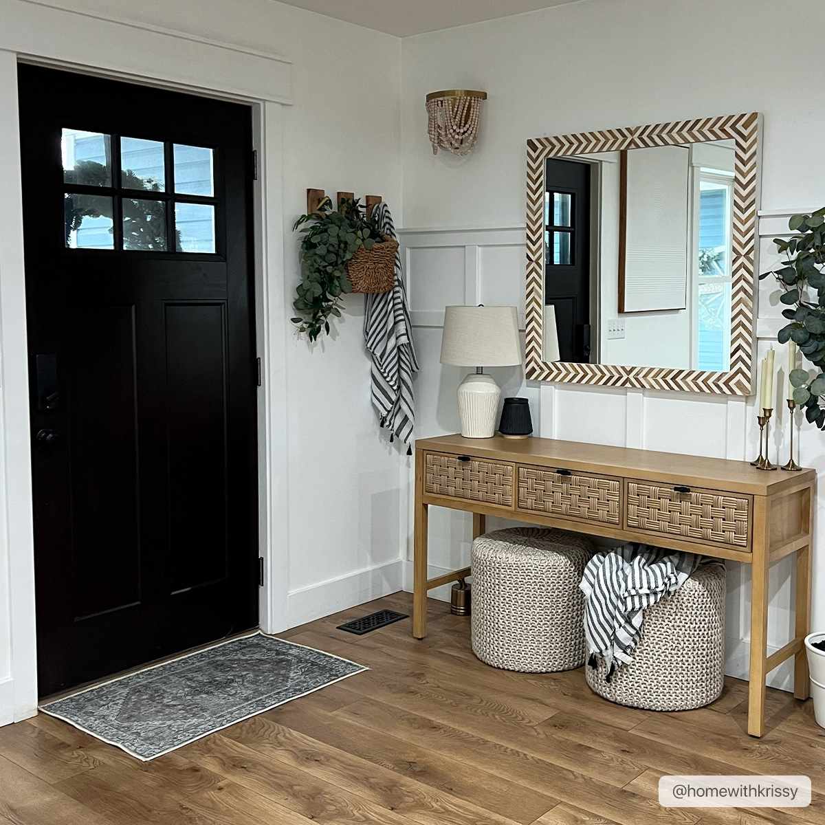 Entryway with wood floors and Athor Washable Rug in dark gray by a black front door. Farmhouse style. Roomscene-Rectangle