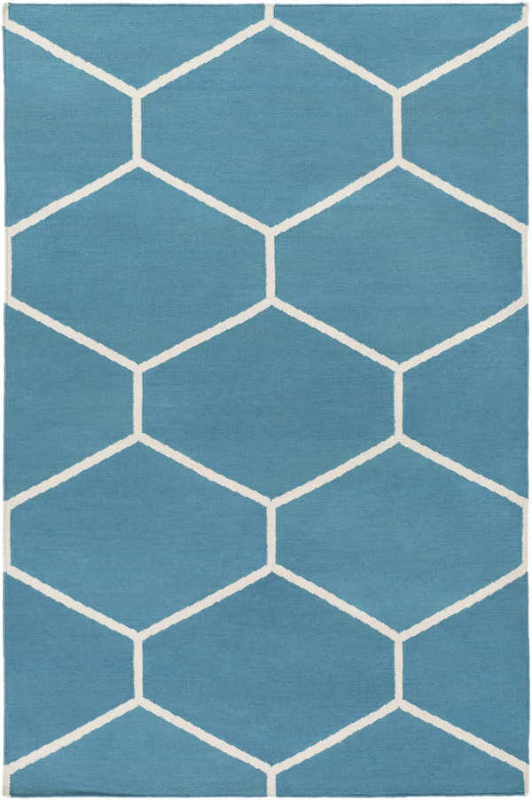 Close-up of the Hoskins Area Carpet. Denim blue cotton rug with an off-white geometric hexagon pattern. Hand woven. Design-Rectangle-576