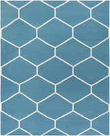 Close-up of the Hoskins Area Carpet. Denim blue cotton rug with an off-white geometric hexagon pattern. Design-Rectangle-810