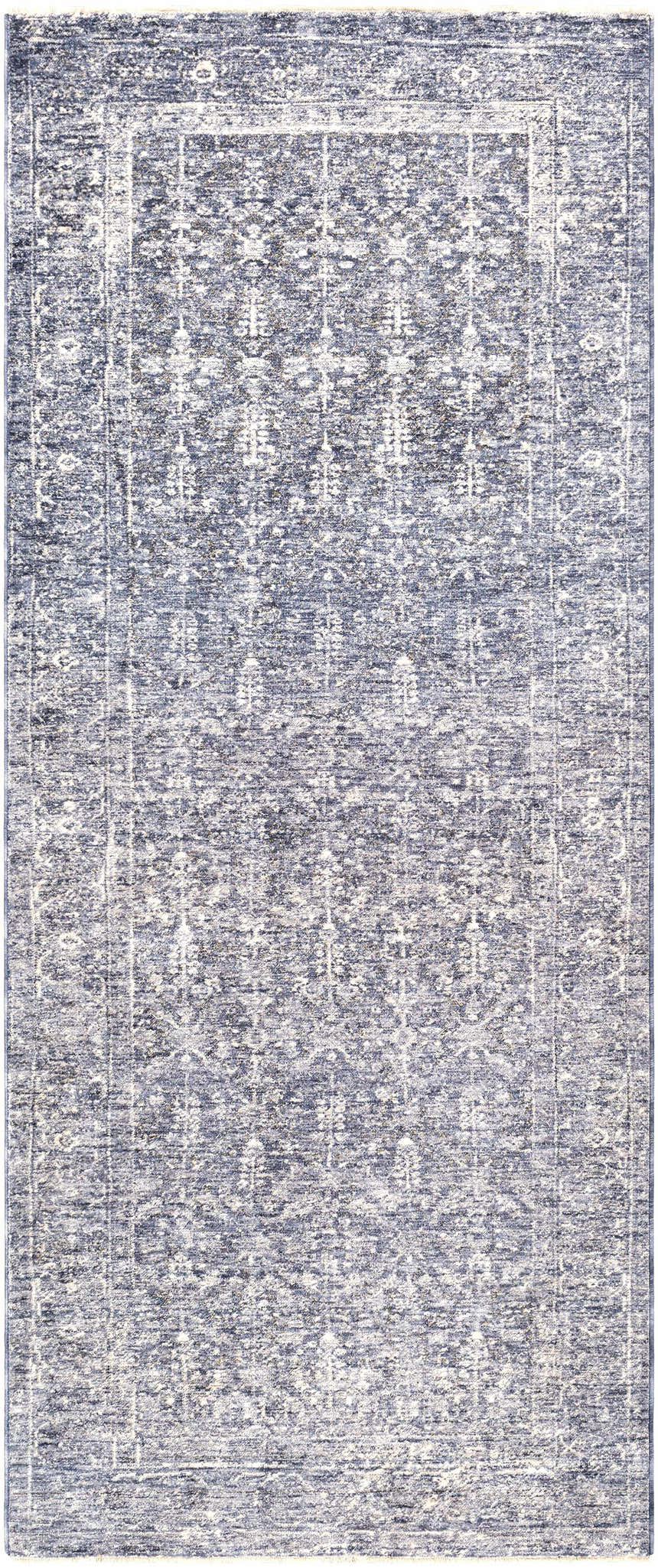 Close-up of the Housatonic Area Rug. Machine-woven polyester rug in denim, light beige, and navy with a traditional oriental pattern. Design-Runner-3310