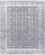 Close-up of the Housatonic Area Rug. Denim, light beige, and navy hues create a traditional oriental rug pattern. Design-Rectangle-810