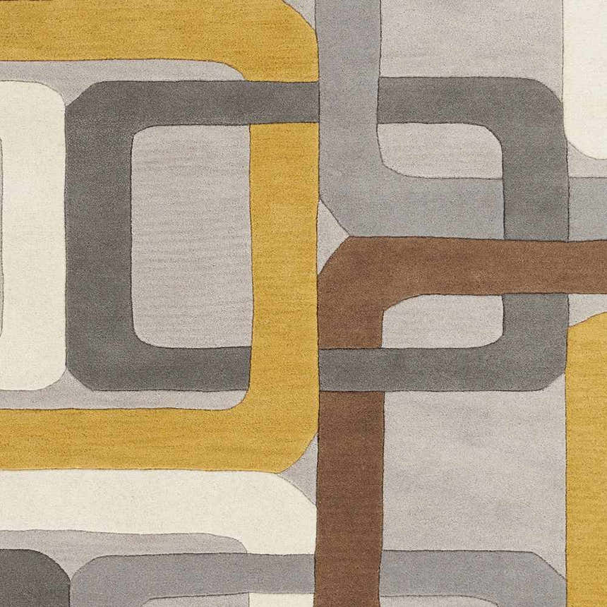 Close-up of the Harlech Area Rug, a hand-tufted wool rug with a contemporary geometric design in brown, gray, ivory, and mustard. Swatch