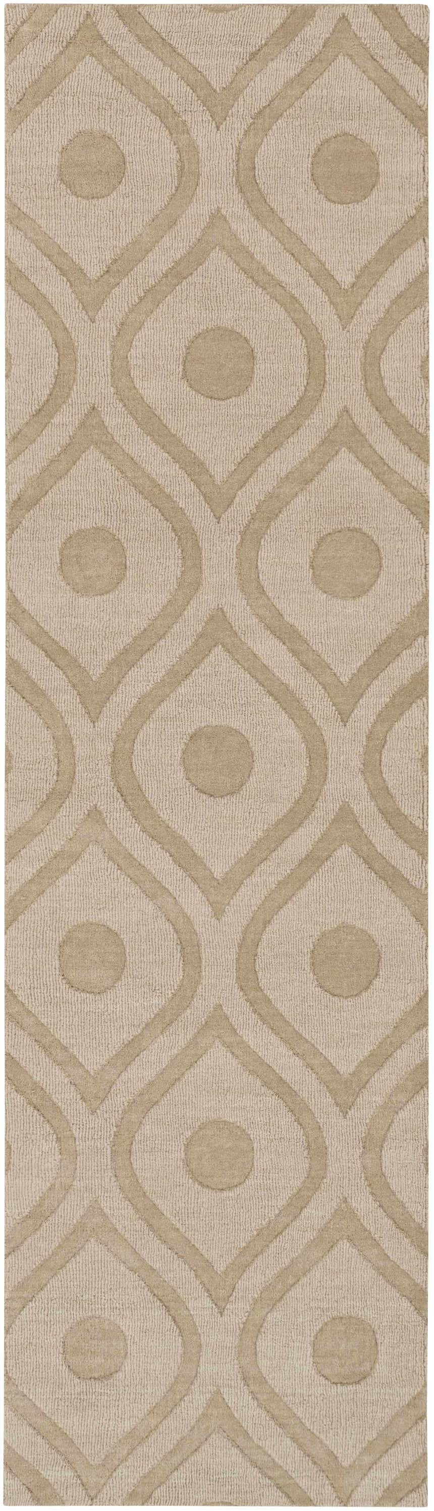 Close-up of the Hundred Area Rug in tan wool, featuring a contemporary geometric pattern with circles and striped texture. Design-Runner-38