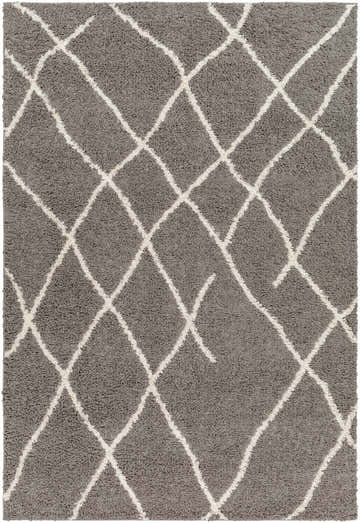 Close-up of the Ildri Area Rug. Gray shag rug with a cream geometric diamond pattern. Farmhouse style. Design-Rectangle-537