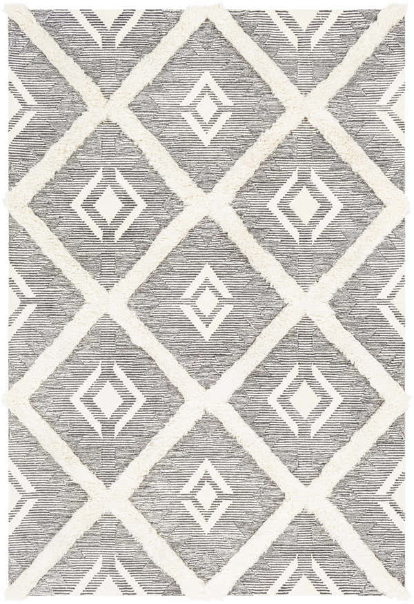 Close-up of the Imnaha Area Rug showing a black and charcoal striped pattern with raised cream diamond shapes. Design-Rectangle-576