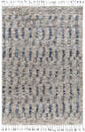 Close-up of the Ingham Premium Rug. Hand-knotted wool rug with blue and charcoal stripes and tassels. Bohemian style. Design-Rectangle-69