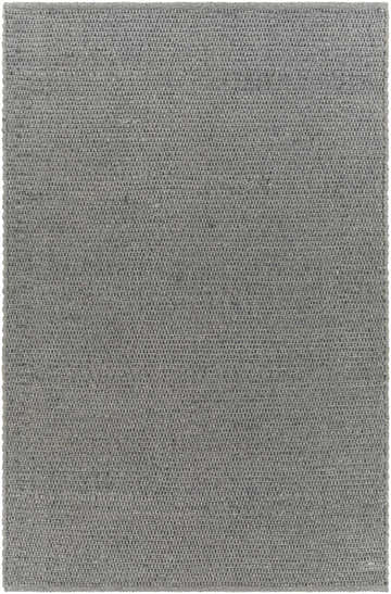 Close-up of the gray Innisfail Area Rug, a hand-woven, solid-color rug with a subtle striped texture. Design-Rectangle-576