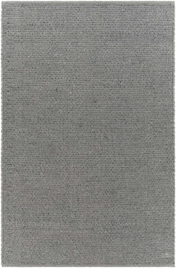Close-up of the gray Innisfail Area Rug, a hand-woven, solid-color rug with a subtle striped texture. Design-Rectangle-576