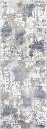 Close-up of the Iroquois Area Rug. Abstract pattern in denim, ivory, light gray, medium gray, and pale blue. Design-Runner-2773