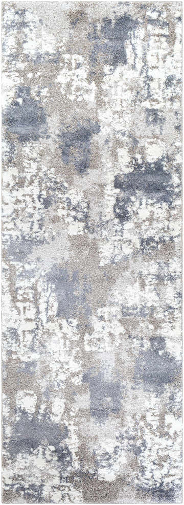 Close-up of the Iroquois Area Rug. Abstract pattern in denim, ivory, light gray, medium gray, and pale blue. Design-Runner-2773