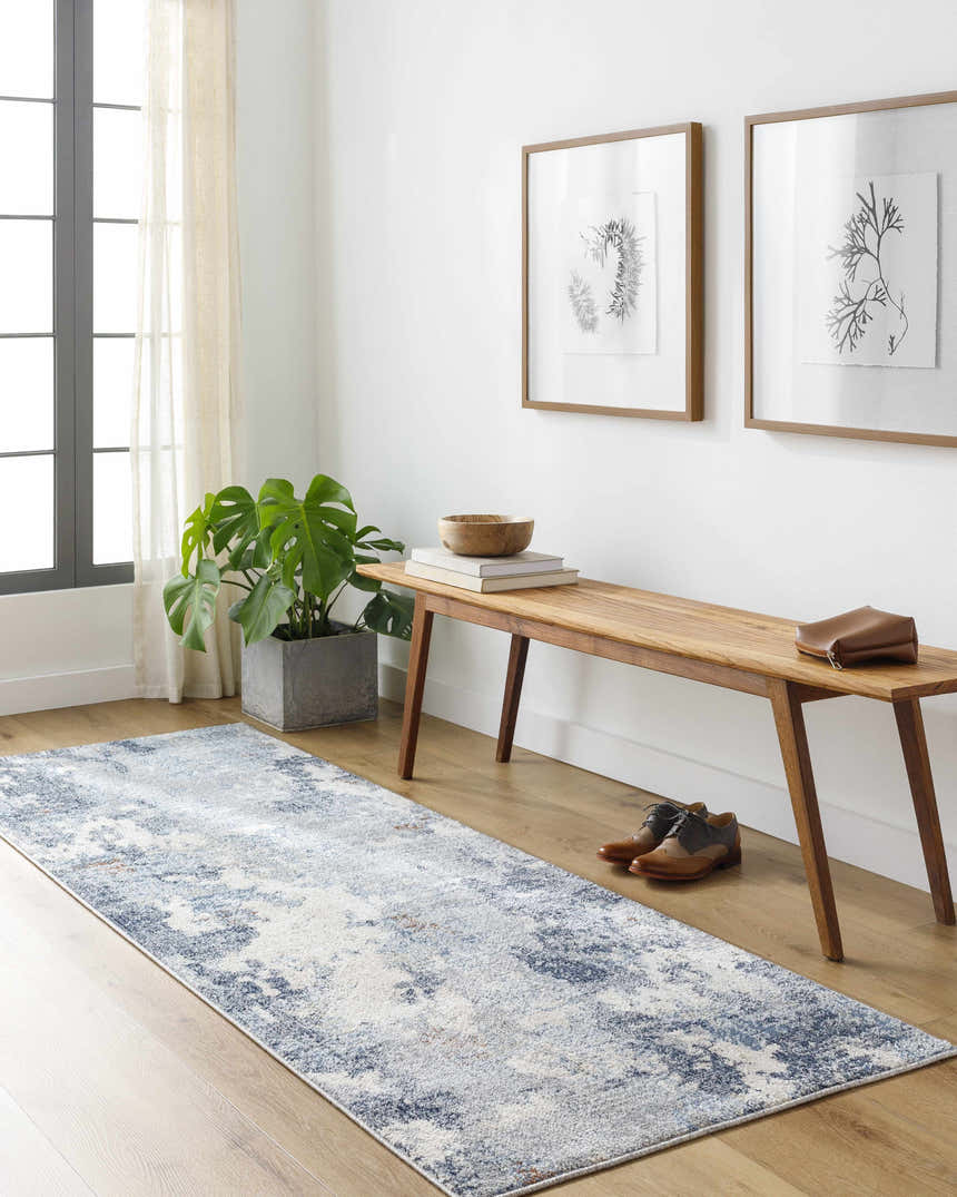 Entryway with light wood floors, bench, and blue and gray Iryna Area Rug runner. Roomscene-Runner