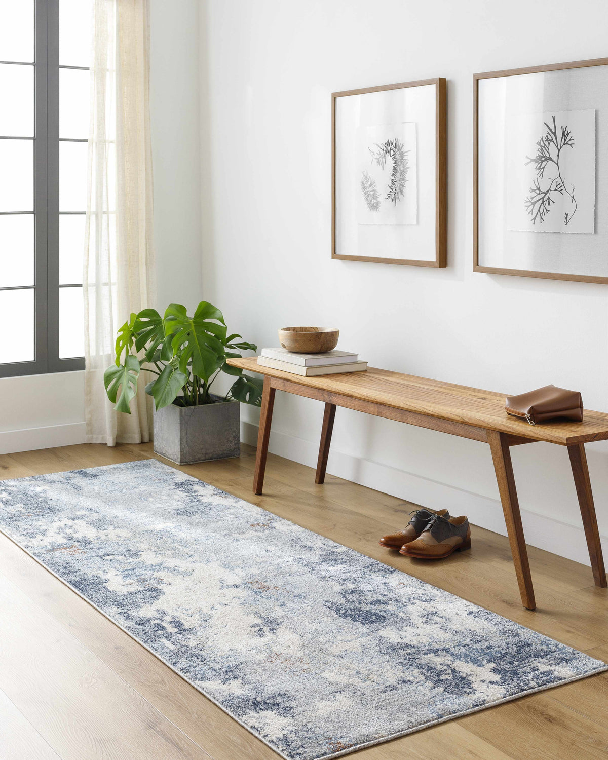 Entryway with light wood floors, bench, and blue and gray Iryna Area Rug runner. Roomscene-Runner