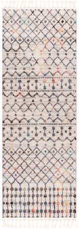 Close-up of the Itogon Area Rug. Bohemian geometric pattern in black, brick red, orange, gray, and teal with fringe. Design-Runner-2773
