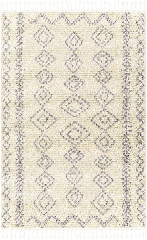 Close-up of Jabonga Area Rug. Cream rug with gray diamond pattern and tassels. Farmhouse style. Design-Rectangle-537