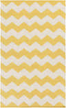 Close-up of the Jackman Area Rug, a hand-woven cotton rug with a bold yellow and ivory chevron pattern. Design-Rectangle-58
