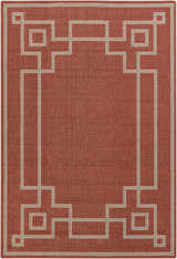 Close-up of the Jarrell Area Rug. Brick red olefin rug with a light beige geometric border pattern. Design-Rectangle-5376