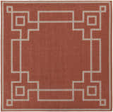 Close-up of the brick red Jarrell Area Rug featuring a light beige geometric border pattern. Design-Square-89
