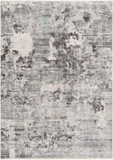 Close-up of the Johnetta Carved Statement Rug. Contemporary design in blue, charcoal, gray, and ivory hues. Abstract pattern. Design-Rectangle-582