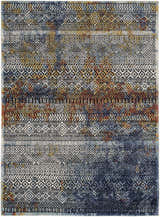 Close-up of the Joroan Area Carpet: bohemian style rug with geometric patterns in blue, yellow, and white. Design-Rectangle-537