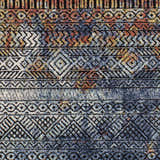 Close-up of the Joroan Area Carpet, a bohemian style rug with blue, orange, and black geometric patterns. Swatch