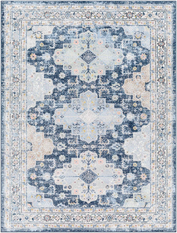 Detailed view of the Jara Washable Area Rug in dark gray, denim, and light gray with a traditional floral pattern. Design-Rectangle-537