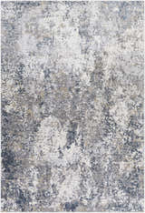 Close-up of the Kanahooka Area Rug. Machine-woven polypropylene rug in charcoal, dark blue, beige, gray, and tan. Contemporary style. Design-Rectangle-6796
