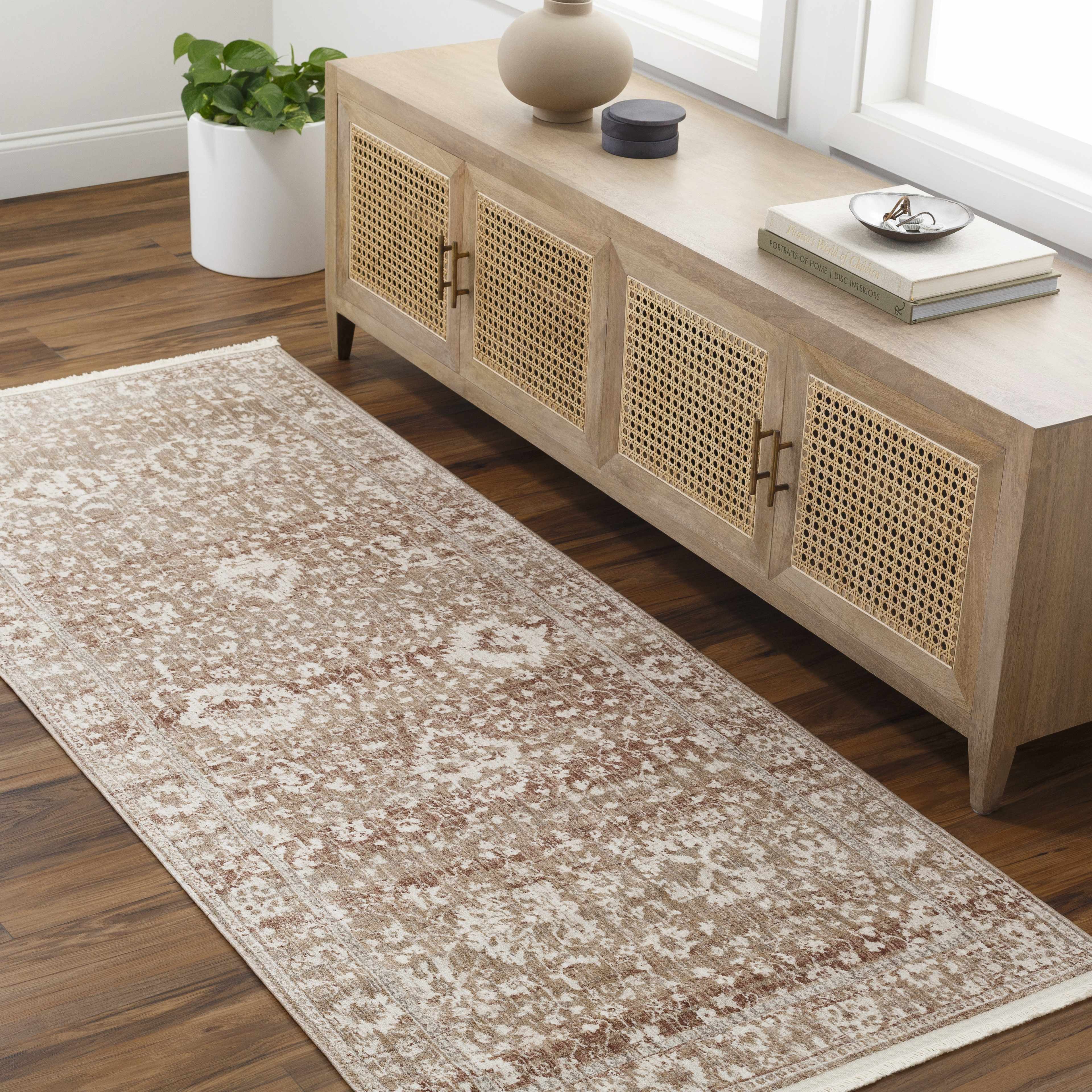 Kaongkod Area Rug - Clearance placed in a styled room setting, harmonizing with surrounding room decor. Traditional Area Rug Backing  