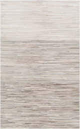 Close-up of the Karabar Premium Area Rug, a hand-crafted, hair-on-hide rug in beige, brown, and silver gray tones. Design-Rectangle-58