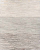 Close-up of the Karabar Premium Area Rug. Hand-crafted hair on hide rug in beige, brown, and gray horizontal stripes. Design-Rectangle-810